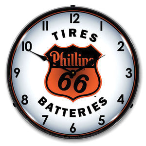 1953-2020 Universal Universal LED Clock. Phillips 66 Tires & Bat.